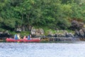 Family in a kayak in Gairloch Harbor, Scotland