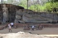 The Gal Vihara at Polonnaruwa in Sri Lanka which includes a standing and a reclining Buddha statue Royalty Free Stock Photo