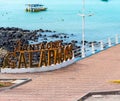 GALAPAGOS ISLAND, SANTA CRUZ - JULY 2, 2019: 3D letters `Santa Cruz Galapagos` at the pier.