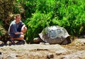 Galapagos Tortoise and tourist