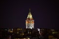 Galata Kulesi Tower at night in Istanbul, Turkey. Ancient Turkish famous landmark in Beyoglu district, European side of the city. Royalty Free Stock Photo