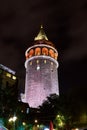 Galata Kulesi Tower at night in Istanbul, Turkey. Ancient Turkish famous landmark in Beyoglu district, European side of the city. Royalty Free Stock Photo