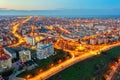 Galati, ROMANIA - March 19, 2021: Aerial view of Galati City, Romania. Night city lights after sunset at blue hour