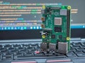 Galati, ROMANIA - March 22, 2020: Close-up of a Raspberry Pi 4 Model-B on a laptop keyboard. The Raspberry Pi is a credit-card-