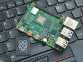 Galati, ROMANIA - March 20, 2020: Close-up of a Raspberry Pi 4 Model-B on a laptop keyboard. The Raspberry Pi is a credit-card-