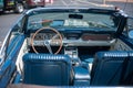 Galati, Romania - September 15, 2019: Black Ford Mustang 1966 convertible interior with focus on the steering wheel