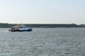 Ecoexpress boat in the rays of the setting sun - Vessel for assistance operations