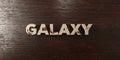 Galaxy - grungy wooden headline on Maple - 3D rendered royalty free stock image