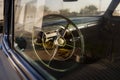 Detail of the steering wheel of a vintage Chevrolet car parked along the US route 66 neat the city of Galena, in the State of Kans