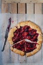 Galeta with plums on the table Royalty Free Stock Photo