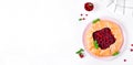 Galette with lingonberry on white. Web banner with copy space