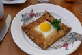Galette sarrasin, buckwheat crepe, with ham cheese and egg, french brittany cuisine