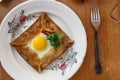 Galette sarrasin, buckwheat crepe, with ham cheese and egg, french brittany cuisine Royalty Free Stock Photo
