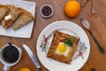 Galette sarrasin, buckwheat crepe, with ham cheese and egg, french brittany cuisine Royalty Free Stock Photo