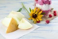 Galia melon in front of ice cream cup Royalty Free Stock Photo