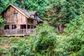 Galiano Island, BC - August 24, 2019: Exterior of Pilgrim Restaurant tucked amidst the forest of Galiano Island