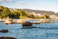 Galicia beach with rocks at sunset Royalty Free Stock Photo