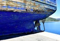 Old wooden galician fishing vessel in a harbor. Galicia, Spain. Royalty Free Stock Photo
