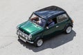 High angle view of a Morris Mini Cooper classic car driving on a road Royalty Free Stock Photo