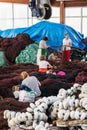 Galician net-menders repairing nets