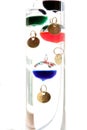 Galileo thermometer with glass balls isolated on white showing t Royalty Free Stock Photo