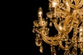 Gallant chandelier with light candles and dark side background
