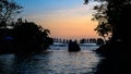 Galle butterfly bridge in Dharmapala Park, beautiful evening sunset skies in the background, scenic landscape photograph.