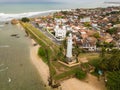 Aerial view of Galle lighthouse and Galle fort walls in the Bay of Galle on the southwest coast of Sri Lanka. Royalty Free Stock Photo