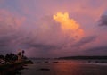 Galle lighthouse stands guard over the Indian ocean at sunset; SriLanka coast. Royalty Free Stock Photo