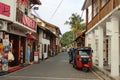 Galle, Sri Lanka - March 9 2018, The narrow street of Galle Fort with parked red tuk tuk, Sri Lanka. Royalty Free Stock Photo