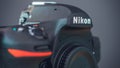 Galle, Sri Lanka - 02 17 2021: Nikon D850 DSLR body with camera body cap, Grip and front dials, and on-off switch close up. Royalty Free Stock Photo