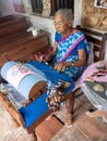 GALLE, SRI LANKA - 03/18/2019: Old Indian woman making bobbin l