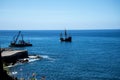 Galleon off Camara de Lobos is a fishing village near the city of Funchal and has some of the highest cliffs in the world