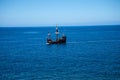 Galleon off Camara de Lobos is a fishing village near the city of Funchal and has some of the highest cliffs in the world