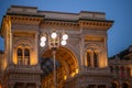 Galleria Vittorio Emmanuel Passage, main entrance to a luxury shopping center evening time. Italy, Milan Royalty Free Stock Photo