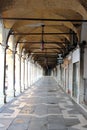 Gallery with columns in the street Venice Italy Royalty Free Stock Photo