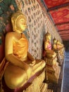 Gallery with old vessels of the seated Buddha in the Buddhist temple Wat Arun. Bangkok, Thailand Royalty Free Stock Photo