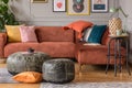 Grey living room interior with brown corner sofa Royalty Free Stock Photo