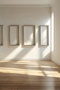 Gallery Wall With Four Silver Frames And Dramatic Sunlight exhibition interior Royalty Free Stock Photo