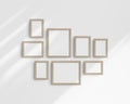 Gallery wall mockup set, 8 birch wooden frames. Clean, modern, and minimalist frame mockup. Royalty Free Stock Photo