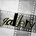 `gallery` word written in black and with random characters. In the background we have vintage film strip in gray tones.