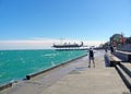 Galley on the embankment of Yalta. pier along the coast, beautiful summer sea.