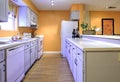 Galley style kitchen in need of remodel Royalty Free Stock Photo