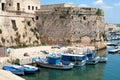 Gallipoli, Angevin castle with fishing boats Royalty Free Stock Photo