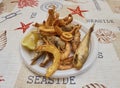 Fritto di paranza, a dish of a assorted small fried fish. Royalty Free Stock Photo