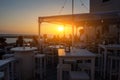 Gallipoli, Puglia, Italy. August 2021. The amazing atmosphere of the sunset makes the aperitif moment magical. People flock to