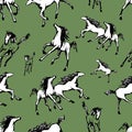 Galloping horses on green background. Drawn seamless pattern. Silhouettes and linear figures of running horses of black and white Royalty Free Stock Photo