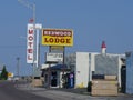 Street photos and roadside signs in front of Redwood Lodge and Coronado Motel in Gallup