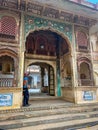 Galta Ji, India - January 4, 2024: A female tourist near Galta Mandir palace Royalty Free Stock Photo