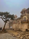 Galta Ji, India - January 4, 2024: Galta Mandir palace on a smoggy day Royalty Free Stock Photo